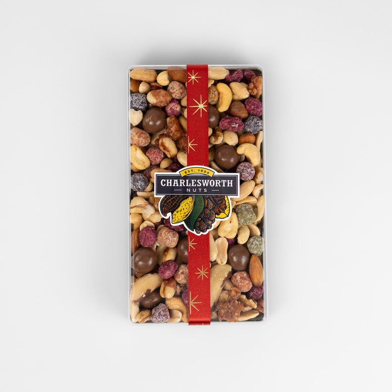 Christmas gift pack filled with chocolates and almonds, Brazil nuts, cashews and fruit pieces.