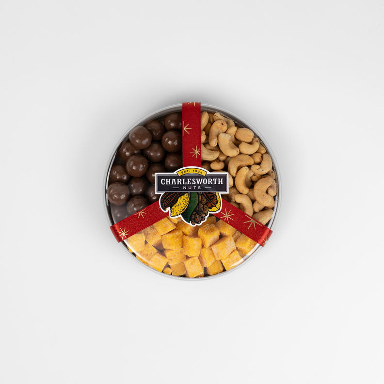 Christmas Gift pack filled with chocolates, cashews and apricot fruit pieces.