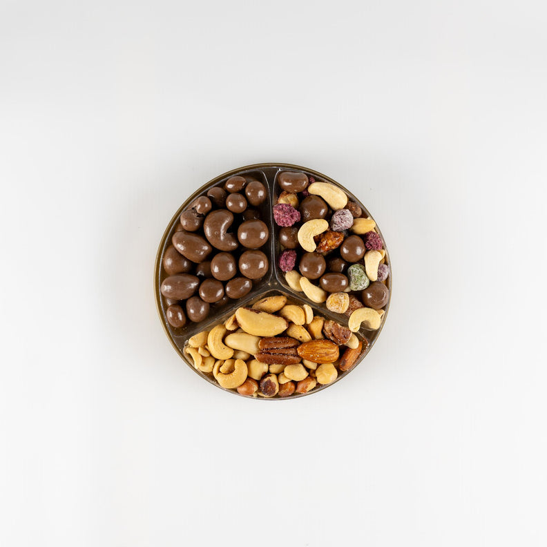 Christmas gift pack beautifully presented filled with delicious peanuts,  almonds, cashews, chocolates and nuts.