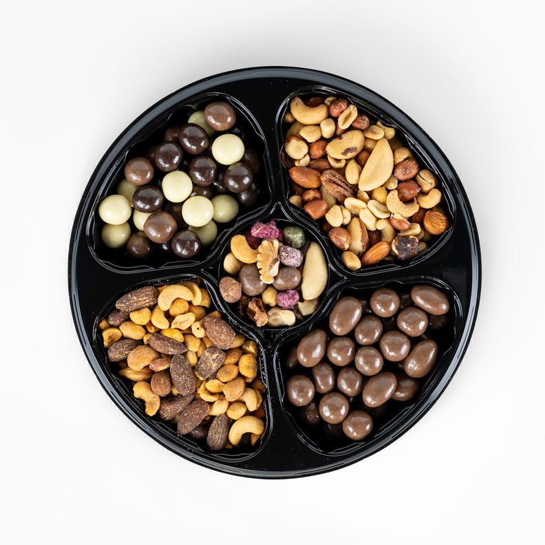 The party snack pack includes chocolates and nuts, ready to be served. 