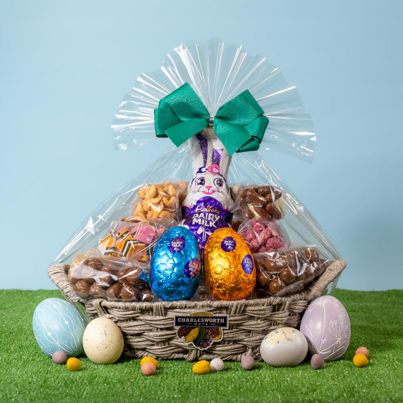 Family Easter Gift Basket filled with Easter eggs, Easter bunnies, chocolates and nuts.