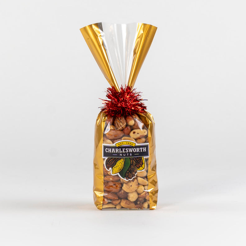 Christmas gift bag filled with salted nuts.