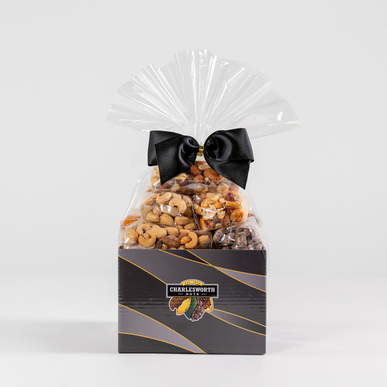 Gift Basket with black ribbon filled with a delicious assortment including Beer Nuts, BBQ Crackers, Salted Cashews, and Smoked Almonds.