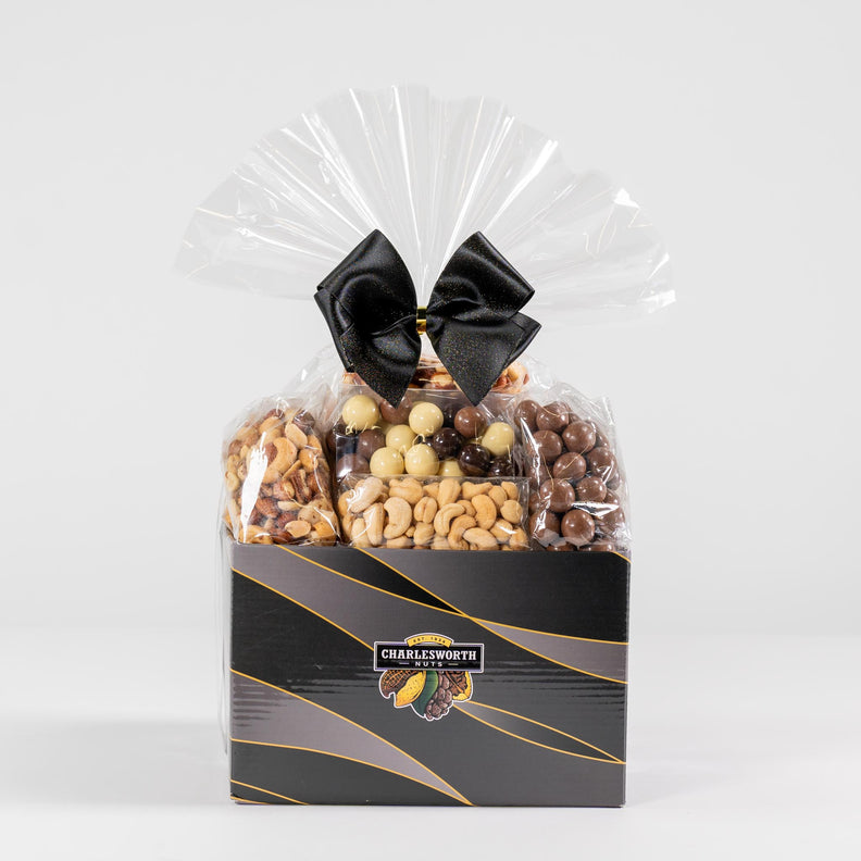 Corporate gift basket filled white chocolate, milk chocolate and nuts 