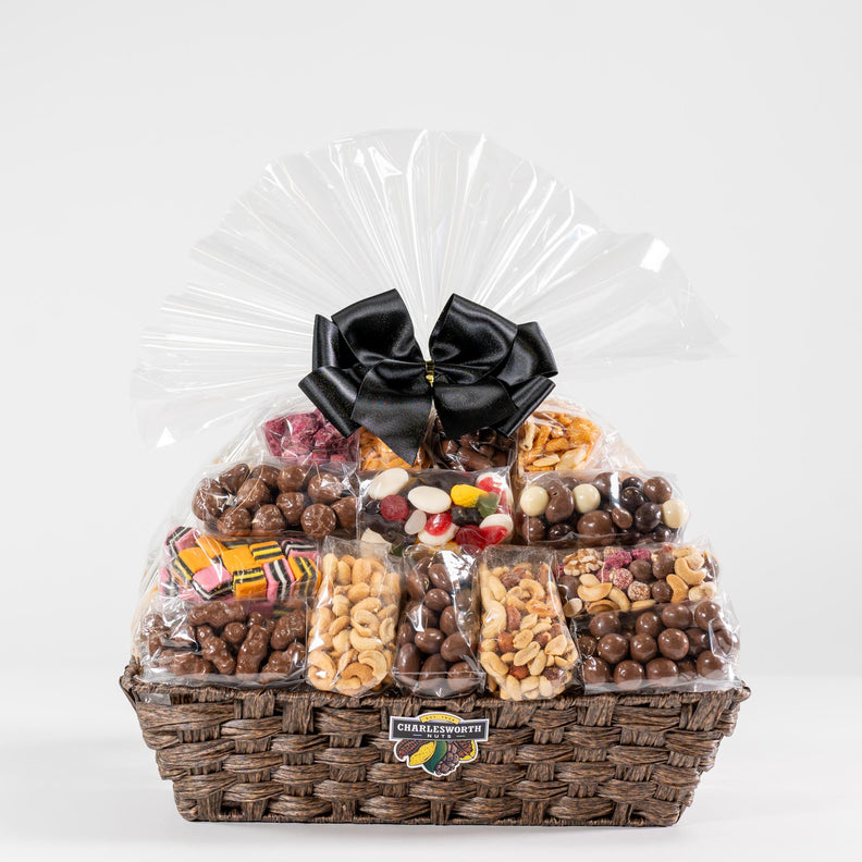 Large gift basket, elegantly tied with a luxurious black ribbon, filled with 33 irresistible Charlesworth nuts and chocolates.