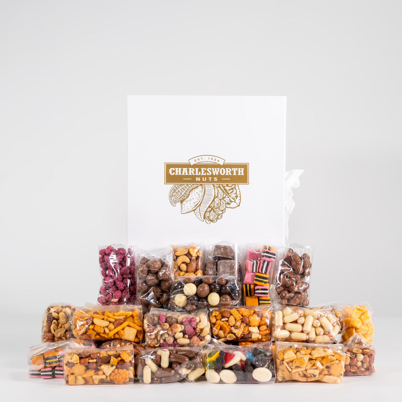 Luxury White Gift Box filled with delicious nuts, chocolates and lollies.